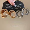 Interlocking Triple Ring Gold And Silver Tone Stud Earrings view 4
