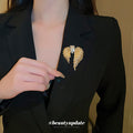 Gold Tone Asymmetrical Angel Wing Brooch With Clear Crystals view 1