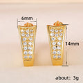 Gold Tone Triple Row Crystal Hoop Earrings with Polished Metal Finish view 5