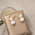 Gold U Shape Crystal Look Pearl Look Huggie Earrings view 2