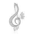 Crystal Treble Clef Brooch With Polished Metal And Sculpted Decorative Details view 2