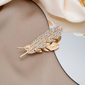 Gold Rhinestone Feather Brooch Pin With Cutout Leaf Detail view 4