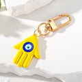 Gold Tone Colorful Hamsa Evil Eye Clip Keychains in Nine Colors view 8