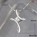 Silver-Tone Twisted Cross Necklace with a Cubic Zirconia Center view 2
