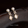 Gold Pearl Drop Earrings Oval Cat Eye Stone Crystal Flower view 1