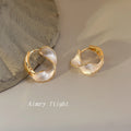 Gold And Silver Tone Twisted Two Color Chunky Huggie Earrings view 3