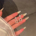 Delicate Crystal Star Stud Earrings with Small Star Drops view 1