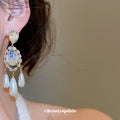 Gold Tone Teardrop Crystal Earrings With Pearl Tassels view 2