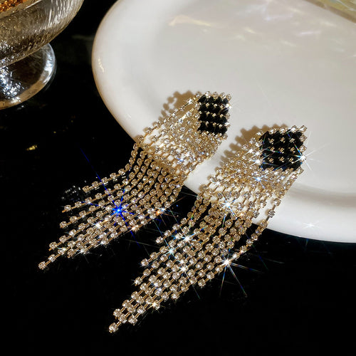 Black and White Crystal Fringe Stud Earrings shown as a complete design