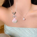Pink Shell Pendant Necklaces with Silver Tone Ocean Charms in Three Styles view 3