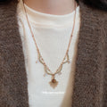 Gold Tone Sunburst and Brown Teardrop Layered Necklace view 3