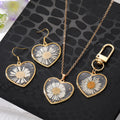 Gold Tone Pressed Daisy Heart Earrings Necklace and Clip Keychain view 1