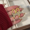Gold Textured Teardrop Clear Cluster Dangle Earrings view 3