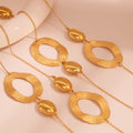 Textured Oval Station Long Necklace in Polished Gold Tone view 4