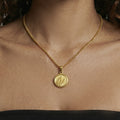 Wing and Floral Round Medallion Necklaces in Gold Tone view 3