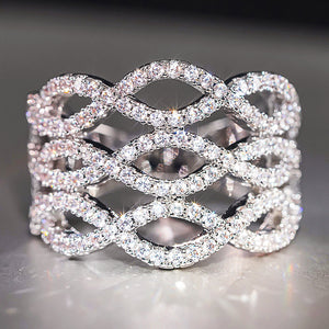 Interwoven Crystal Wave Wide Band Ring in Silver Tone