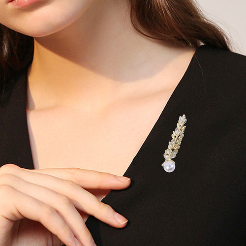 Crystal Wheat Brooch displayed in a styled setting