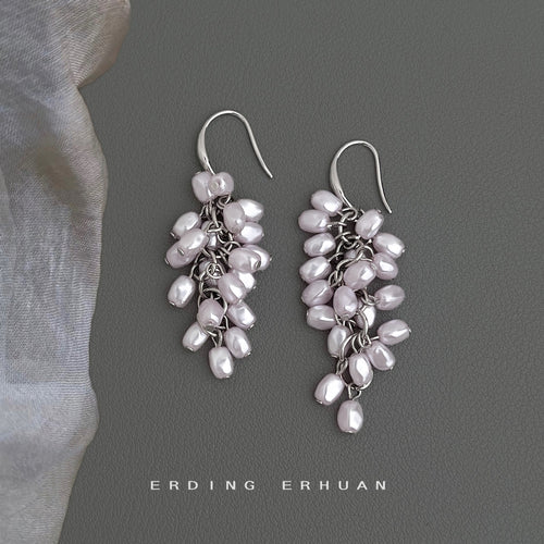 Silver-tone pale-purple-pearl cluster long hooks in the first product display.