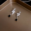 Silver Winged Bat and Black Teardrop Stud Earrings view 3