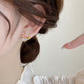Pink Floral Crystal Stud Earrings With Polished Metal Details view 3