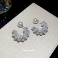 Silver Tone Pearl Look Crescent Stud Earrings with Beaded Texture view 3