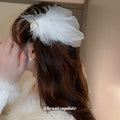 White Feather Hair Clip With Large Pearl Like Center Accent view 3