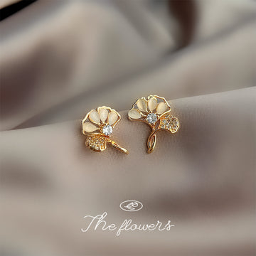 Gold Tone White Ginkgo Leaf And Clear Stone Stud Earrings