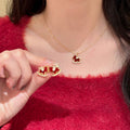Red Enamel Rocking Horse Necklace and Stud Earrings view 3