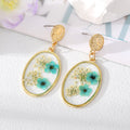 Gold Tone Oval Clear Resin Pressed Flower Drop Earrings view 4