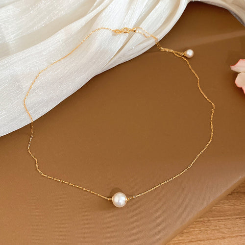 Delicate Pearl Strand Necklace with Single Pearl Drop worn view