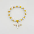 White And Gold Tone Cross Bead Bracelet With Winged Cross Charm view 6