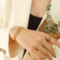 Gold Crossed Knot Geometric Twisted Multi Strand Bracelet view 1