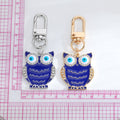 Gold and Silver Tone Navy Owl Evil Eye Clip Keychains view 4
