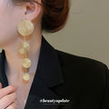 Textured Disc Long Drop Earrings in Five Metallic Colors view 4