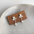 Matte Silver Rose Flower Stud Earrings White Pearl Drop view 3