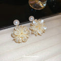 White Flower Cluster Stud Earrings With Pearl Look Centers view 4