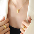 Gold Sitting Bunny Pendant Necklace on Fine Cable Chain view 1