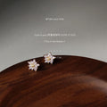 Gold Tone Clear And Pink Stone Snowflake Starburst Stud Earrings view 3