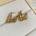 Crinkled Geometric Stud Earrings in Gold and Silver view 8