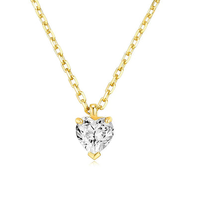 Gold tone heart clear CZ pendant necklace on white background