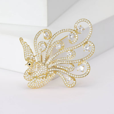 Gold rhinestone phoenix brooch clear crystal swirl tail front