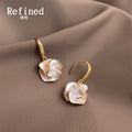 Gold Tone Clear Stone Hook And Iridescent Flower Drop Earrings view 3