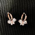 Butterfly Clear Stone Huggie Hoop Earrings Three Metal Colors view 3