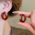 Layered Triple C Hoop Earrings in Gold Red and Silver Tones view 7