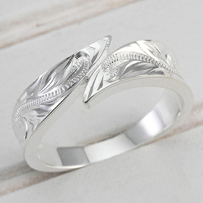 Silver engraved leaf wrap ring overlapping ends top view