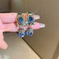 Blue Crystal Oval Statement Clip On Earrings with Polished Metal Accents view 6