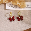 Red Bow Crystal Look Gold Tone Huggie Dangle Earrings view 3