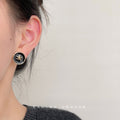 Black Enamel Round Camellia Stud Earrings Gold Rim view 2