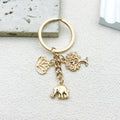Gold-Tone Elephant Keychain With Lotus And Tree Charms view 4