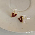 Gold Tone Red Enamel Heart Stud Earrings with Polished Metal Finish view 4